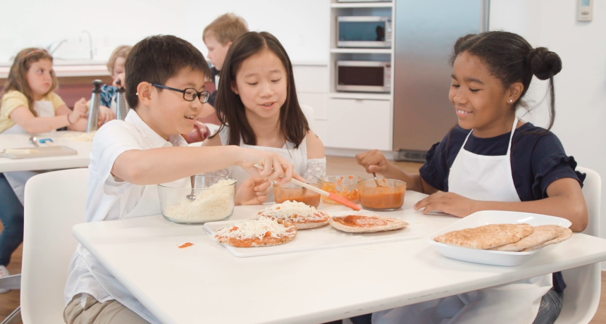 Title text placeholder Kids in classroom learning about healthy food and the nutrition information they need to build life-long healthy habits