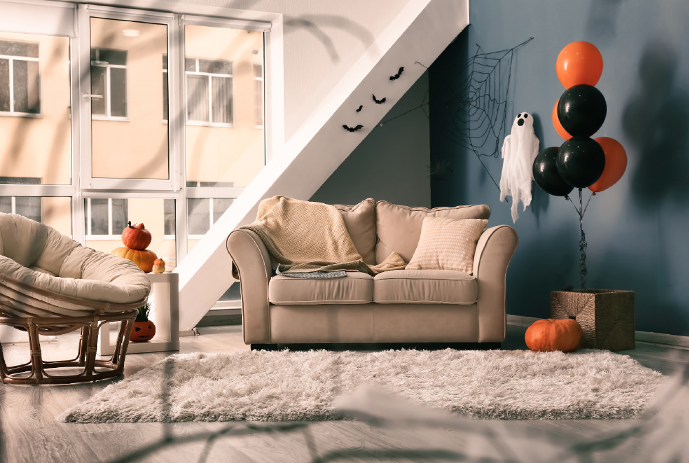 If you want to decorate a small place, try pops of orange with a pumpkin and balloons. Simple and cute!