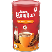 CARNATION Poudre de chocolat chaud riche et crémeuse. 1,7 kg donne 68 portions.