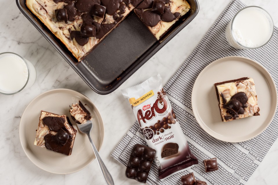 Aero Dark Chocolate Cheesecake Brownies recipe. Cheesecake and brownie batter mash up together in this ultimate dessert.