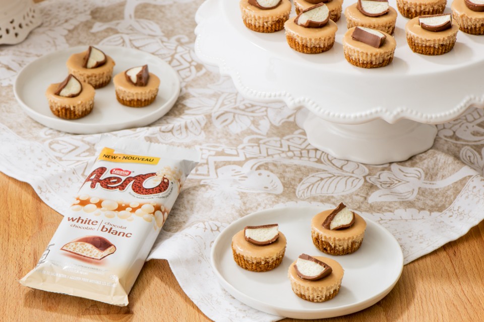 Mini AERO White Chocolate Cheesecakes recipe. Indulgent mini cheesecakes topped with chocolate pieces.